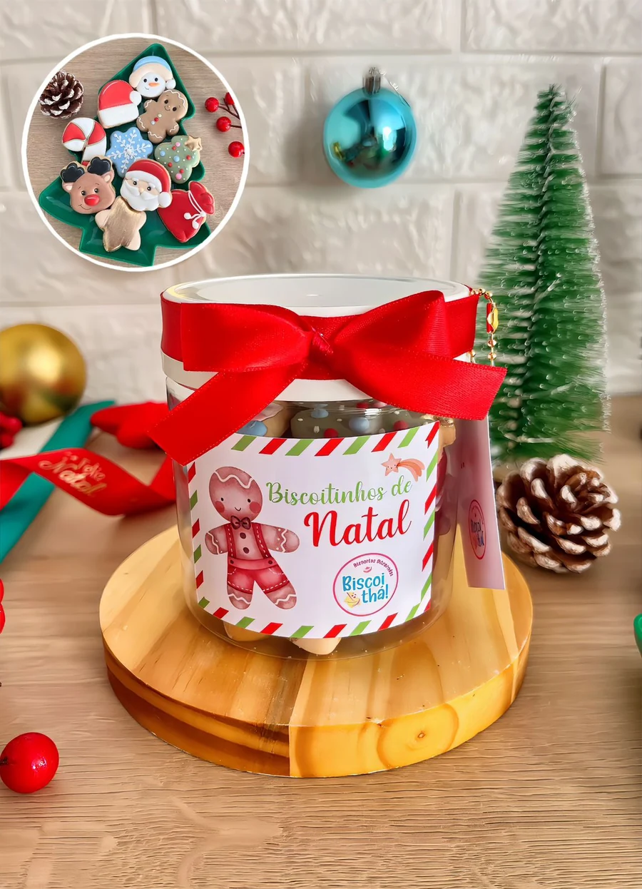 Pote de biscoitos de Natal com decoração vermelha e laço de cetim